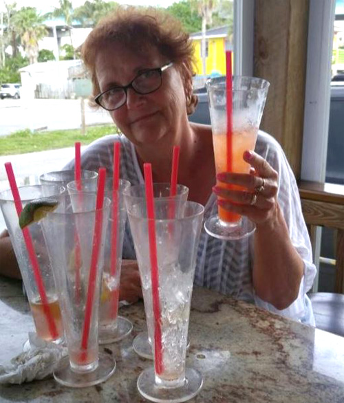Beach Bar Fun-Empty glasses in front of one lady-SOB