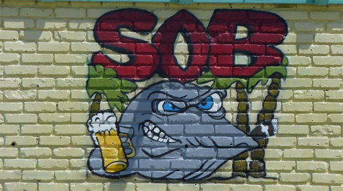 side sign on painted bricks-SOB